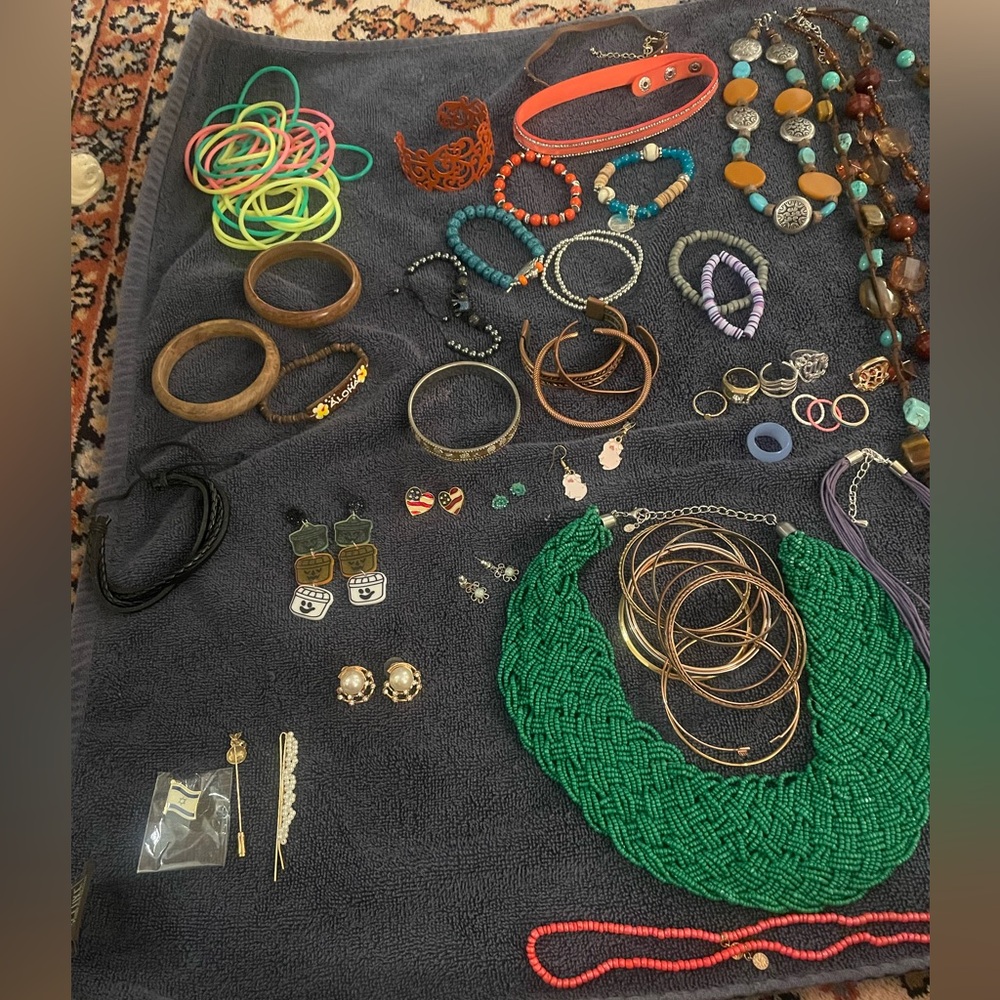 Bulk costume jewelry with Joy Mangano jewelry case.